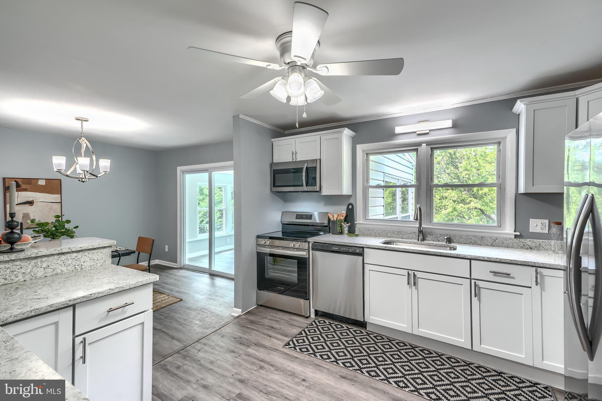 8020 Redstone Road Kingsville, MD 21087 - Photo 20 of 50 a kitchen with a sink stove and microwave