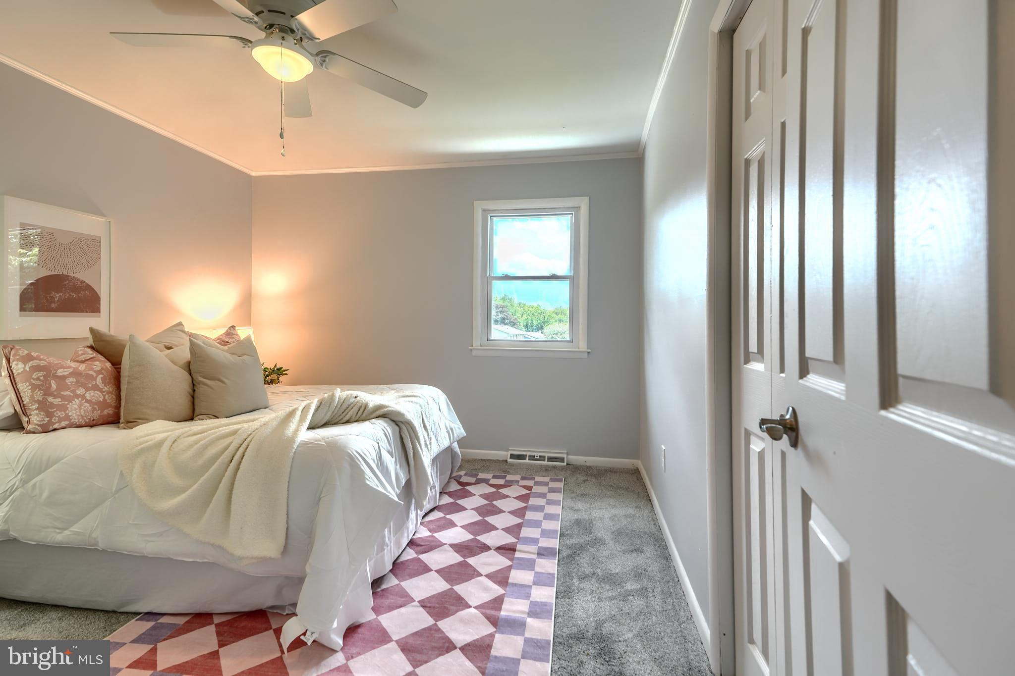 8020 Redstone Road Kingsville, MD 21087 - Photo 27 of 50 a bedroom with a bed and a window