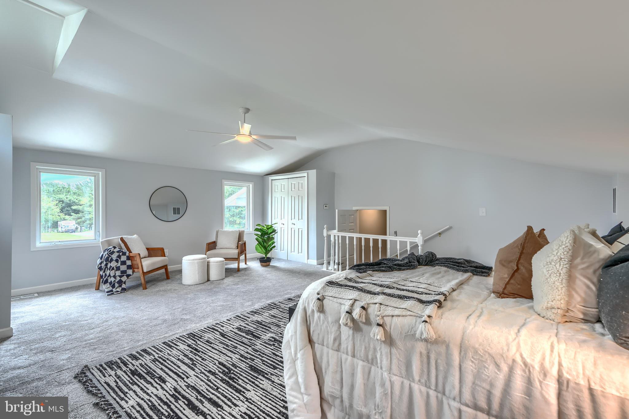 8020 Redstone Road Kingsville, MD 21087 - Photo 30 of 50 a bedroom with a bed and wooden floor