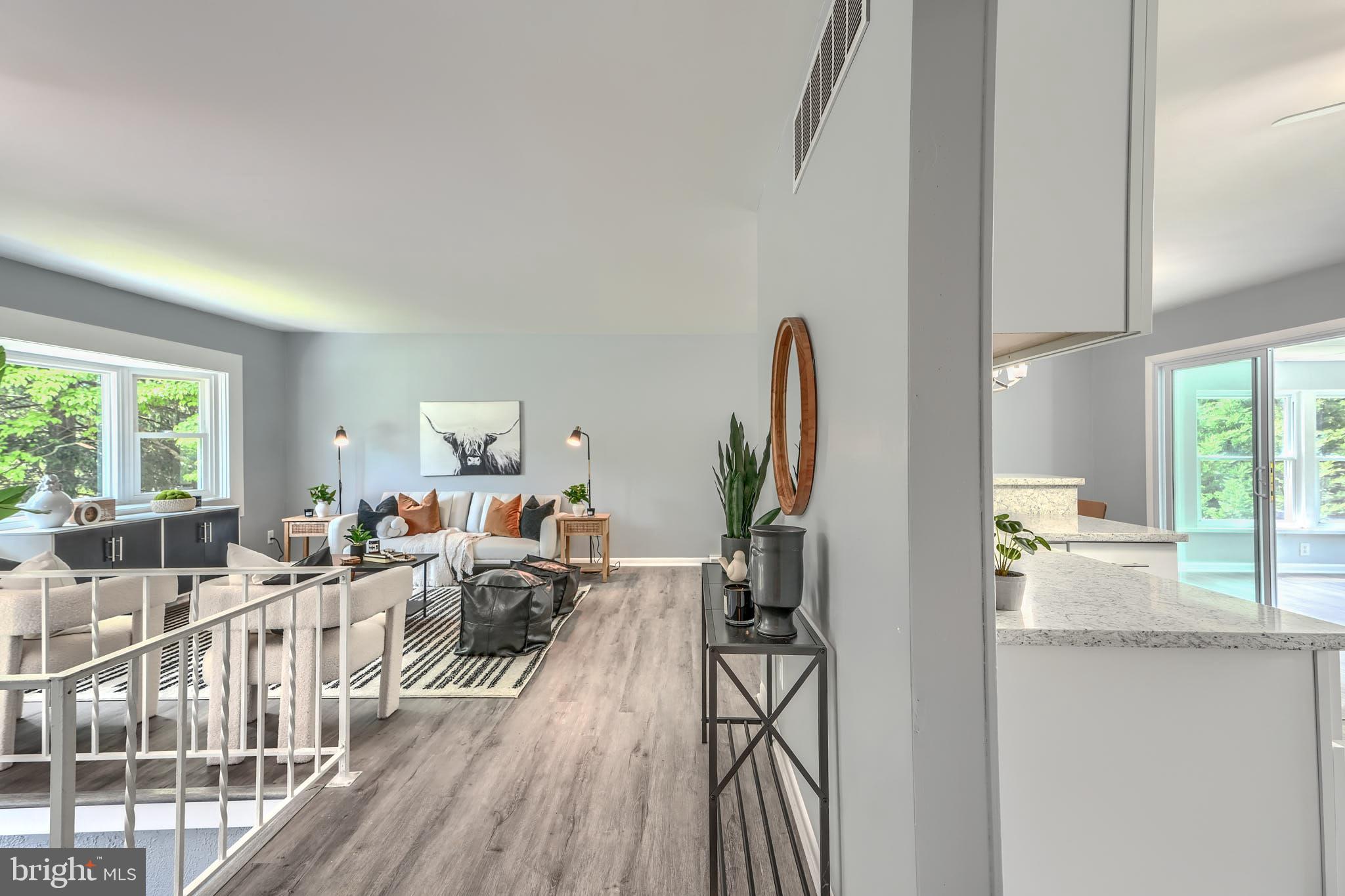 8020 Redstone Road Kingsville, MD 21087 - Photo 3 of 50 a living room with furniture wooden floor and a large window