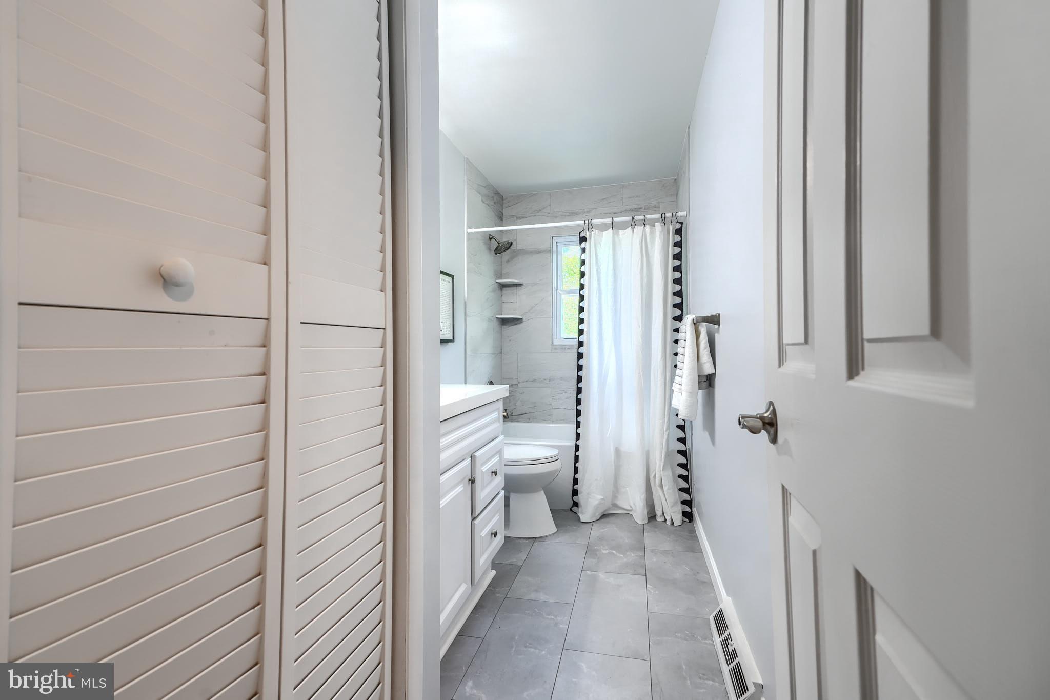 8020 Redstone Road Kingsville, MD 21087 - Photo 32 of 50 a bathroom with a shower and a toilet