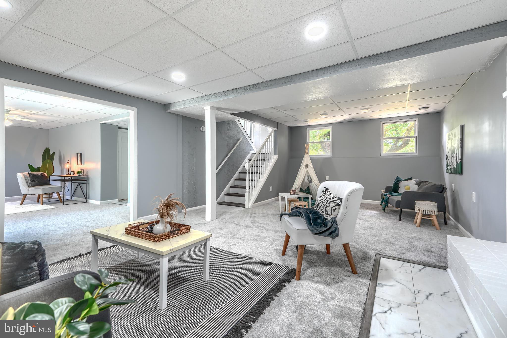 8020 Redstone Road Kingsville, MD 21087 - Photo 35 of 50 a living room with furniture and a potted plant