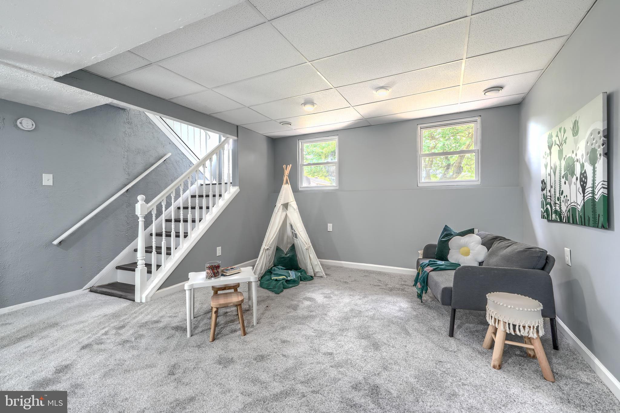 8020 Redstone Road Kingsville, MD 21087 - Photo 37 of 50 a room with furniture and stairs