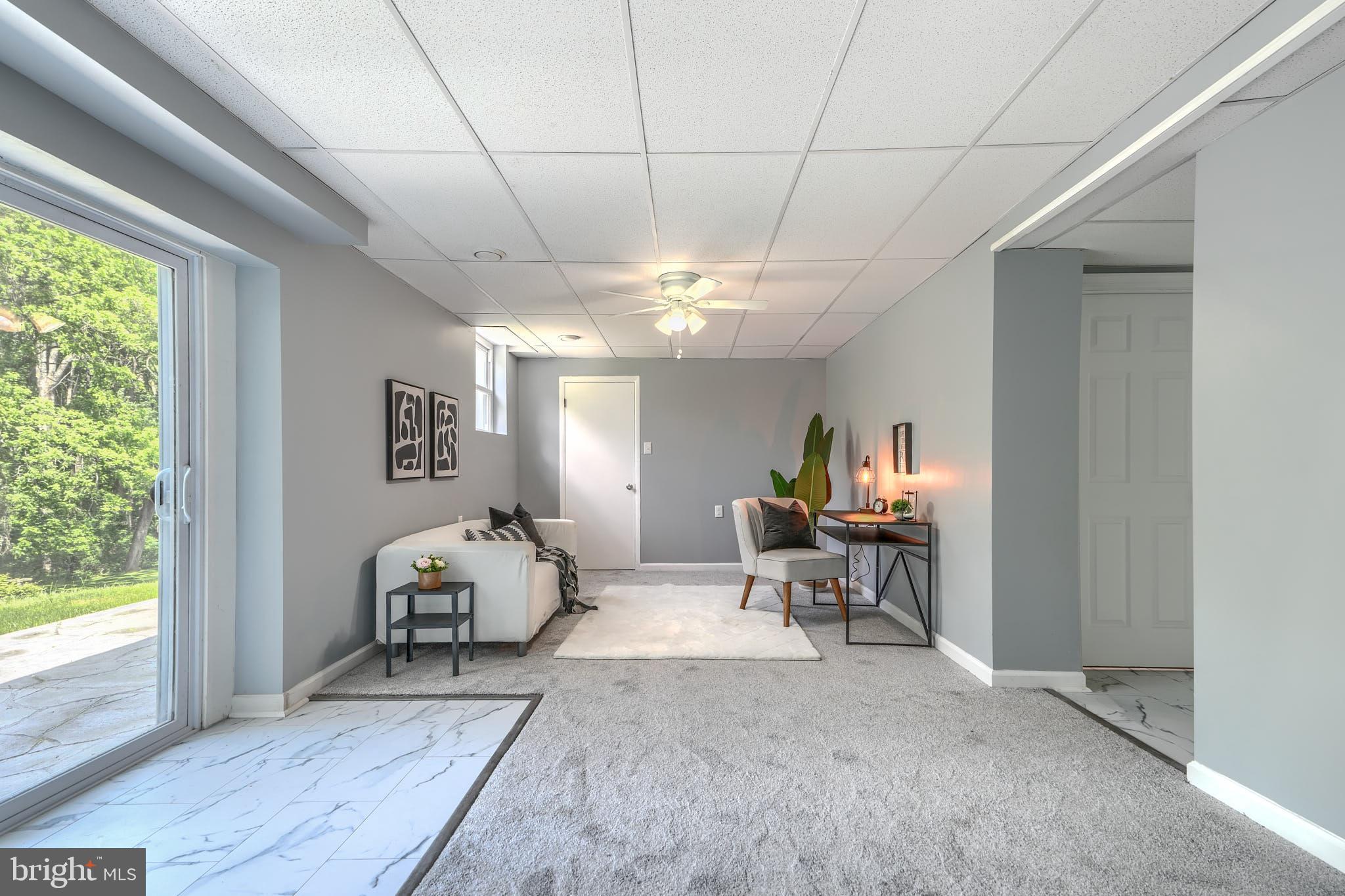 8020 Redstone Road Kingsville, MD 21087 - Photo 39 of 50 a living room with furniture and a large window