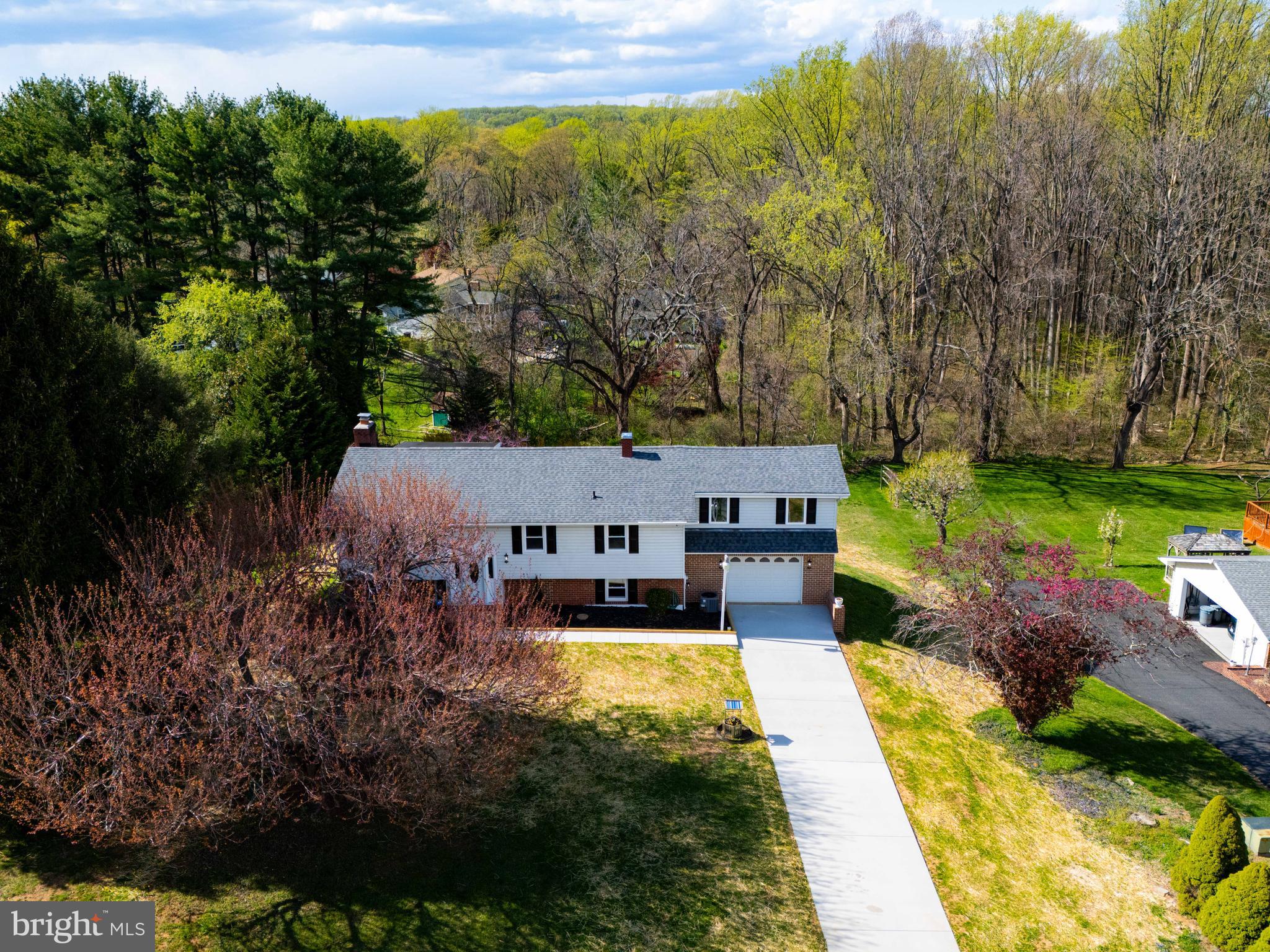 8020 Redstone Road Kingsville, MD 21087 - Photo 50 of 50 an aerial view of a house with swimming pool garden and lake view