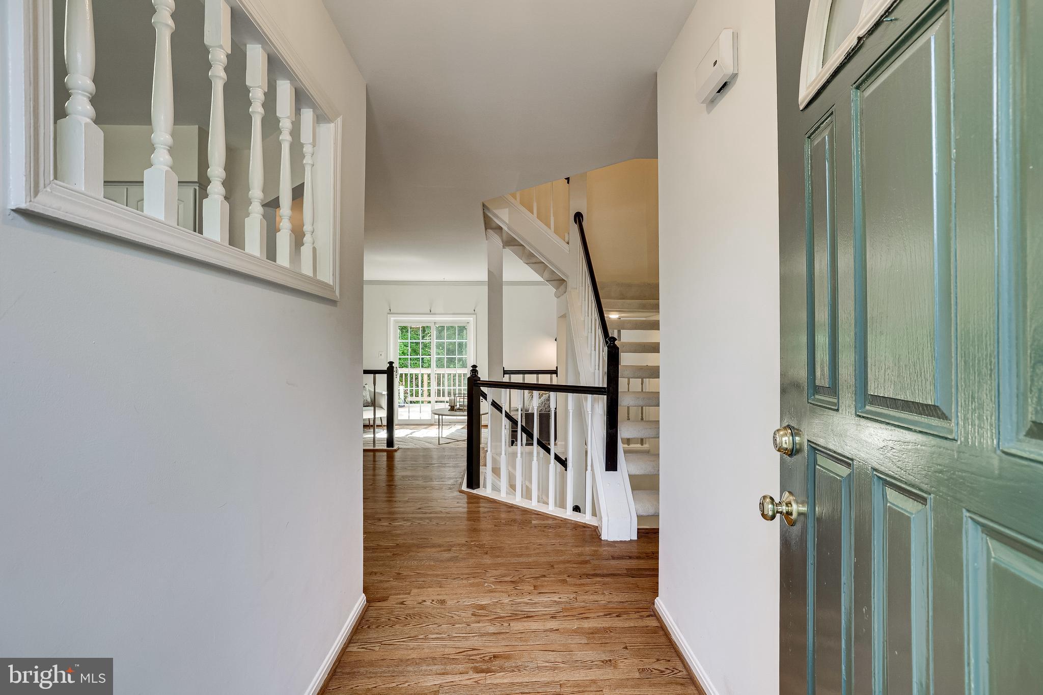 11962 Sentinel Point Court Reston, VA 20191 - Photo 3 of 62 The main level has beautiful hardwood floors.
