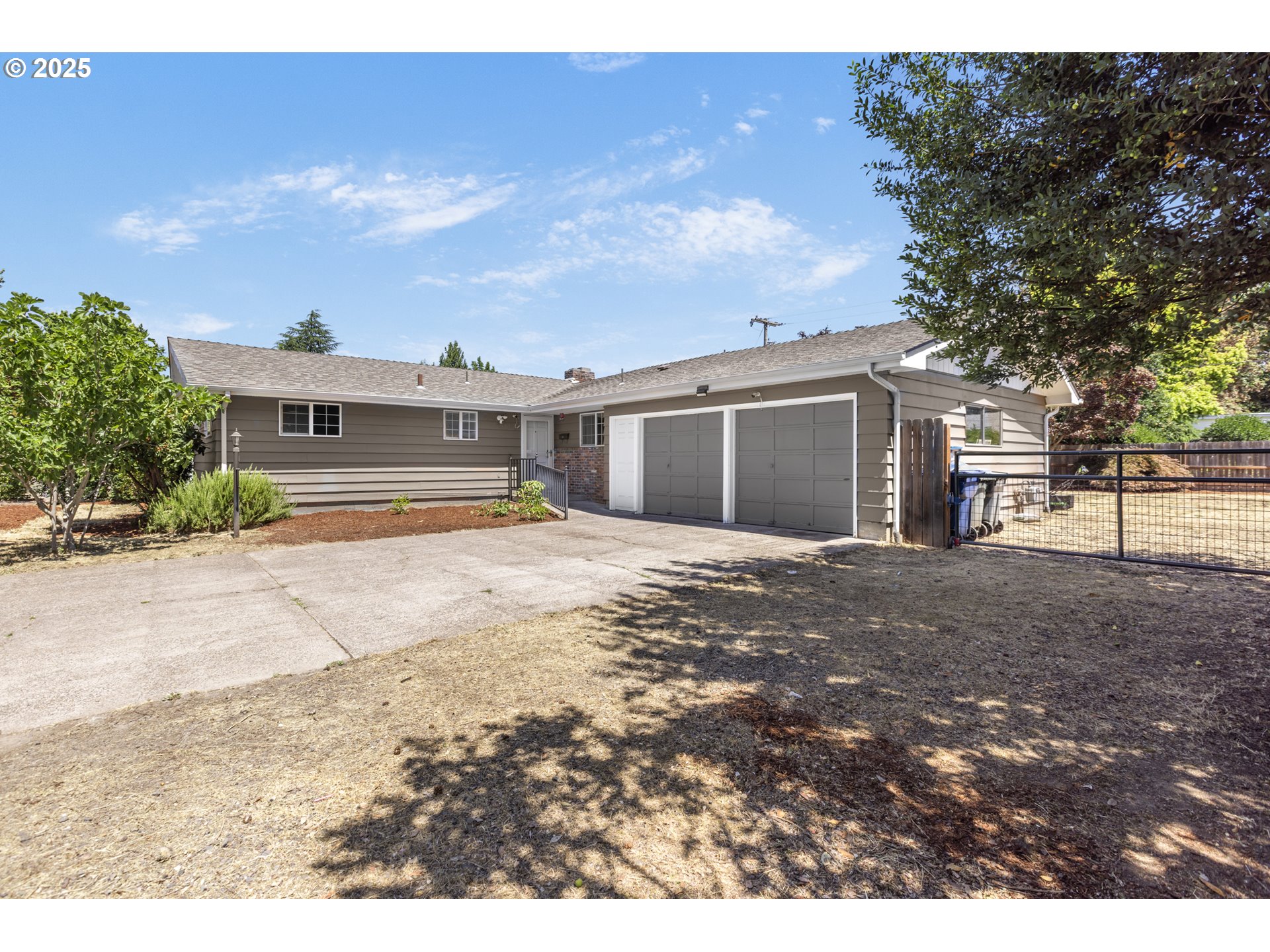 457 Archie Street Eugene, OR 97402 - Photo 1 of 48 a view of a house with a yard