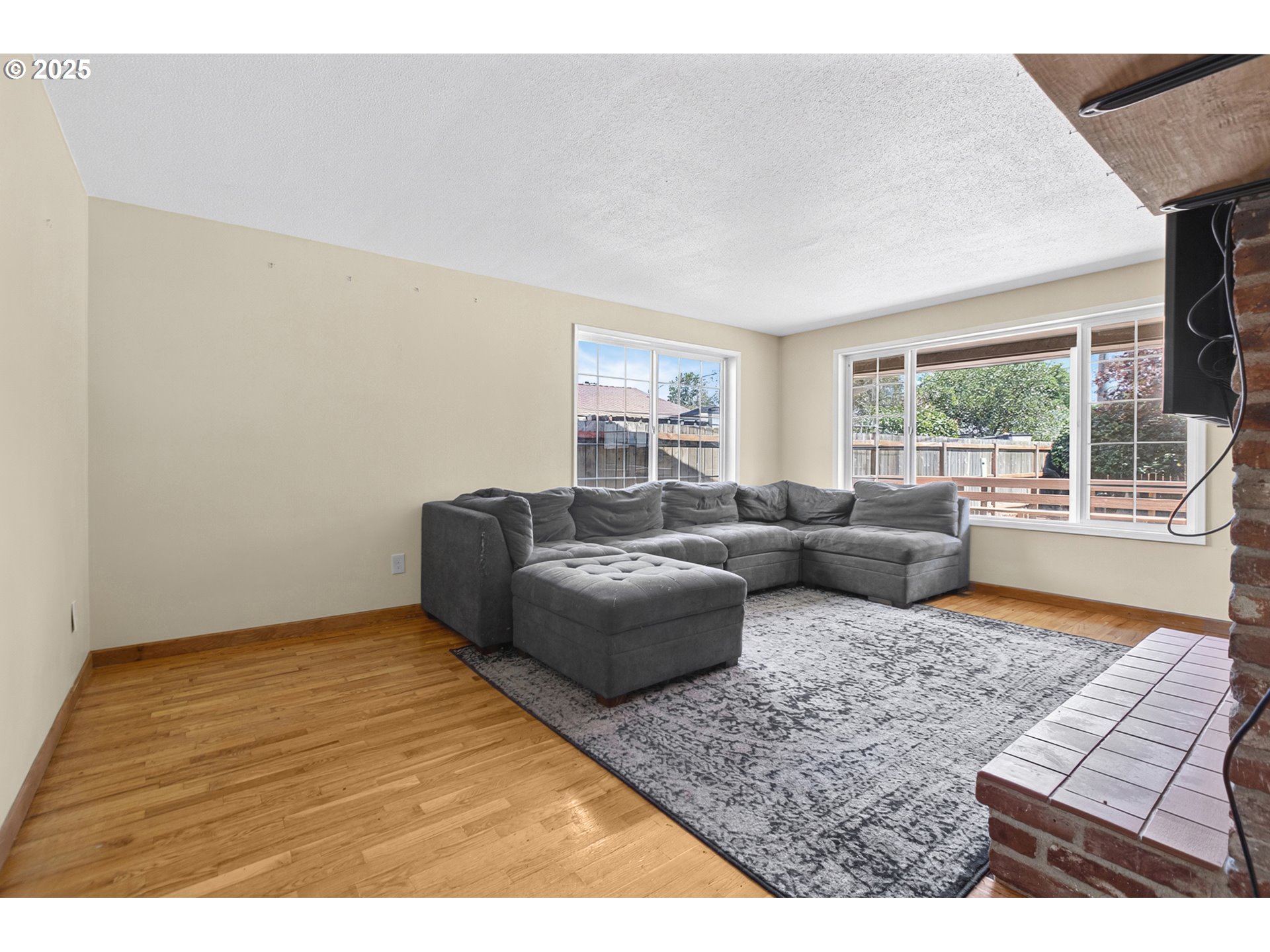 457 Archie Street Eugene, OR 97402 - Photo 19 of 48 a living room with furniture and a rug