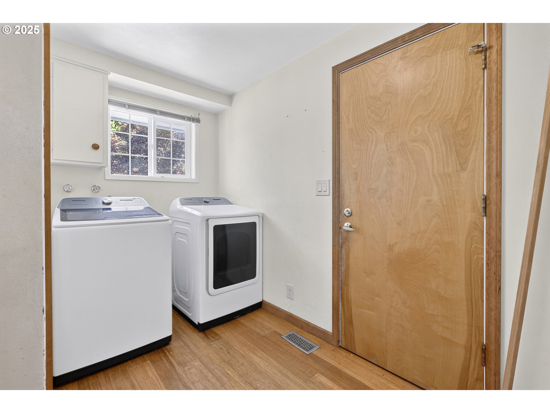 457 Archie Street Eugene, OR 97402 - Photo 32 of 48 a view of storage and utility room with washer and dryer