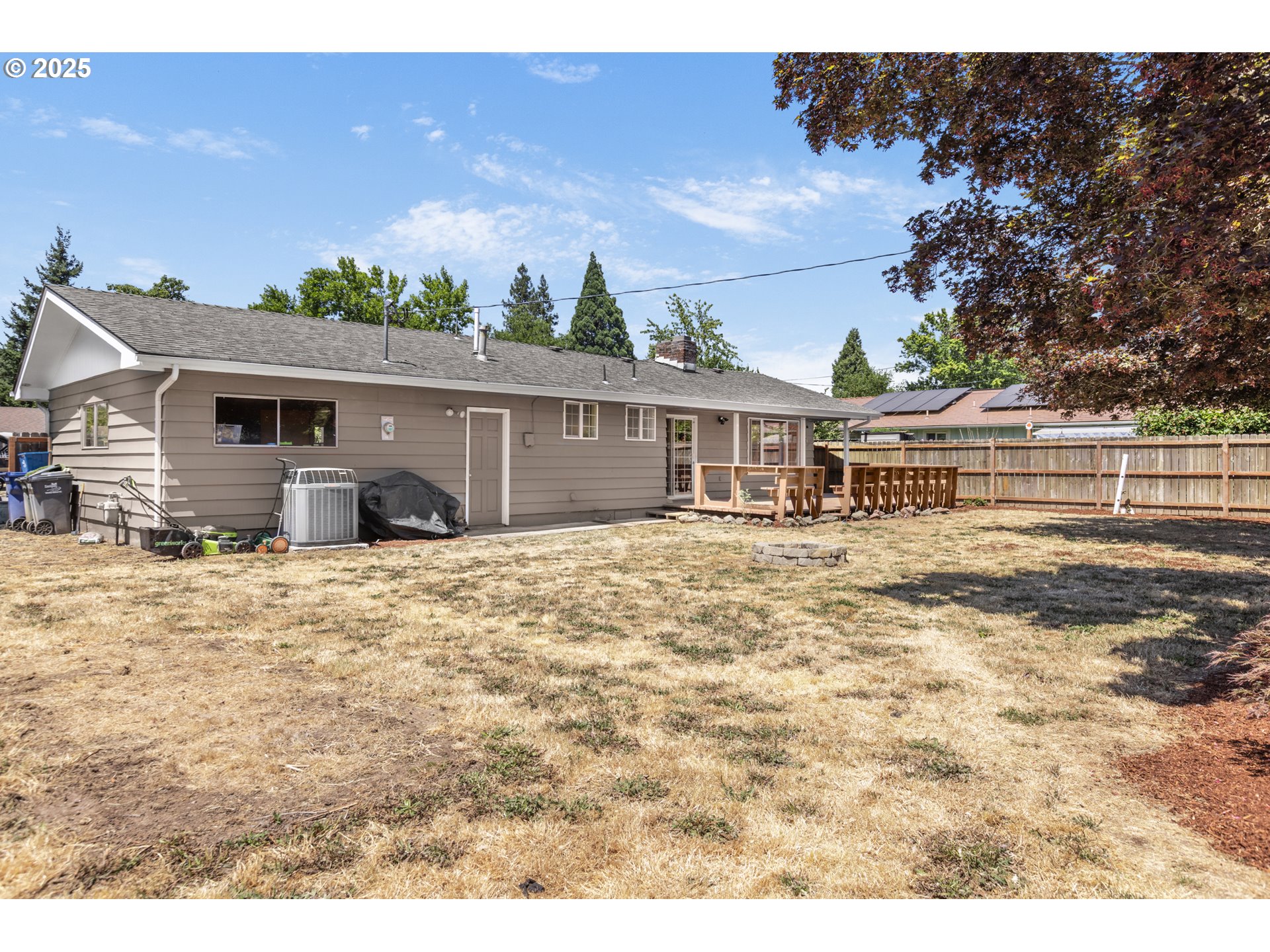 457 Archie Street Eugene, OR 97402 - Photo 38 of 48 a front view of a house with a garden