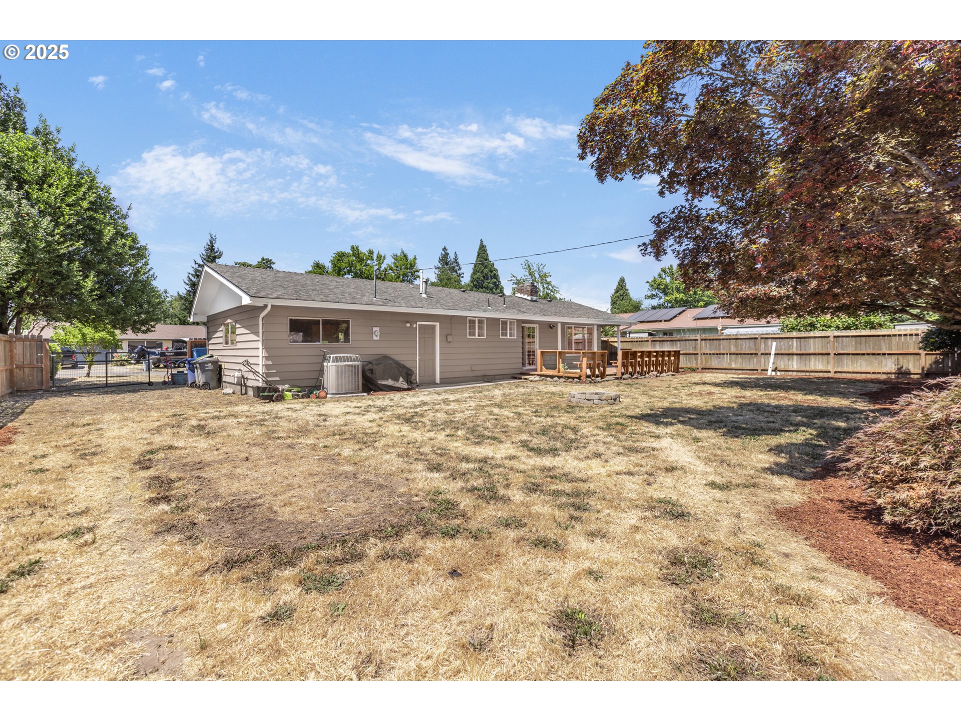457 Archie Street Eugene, OR 97402 - Photo 39 of 48 a view of house with outdoor space and sitting area