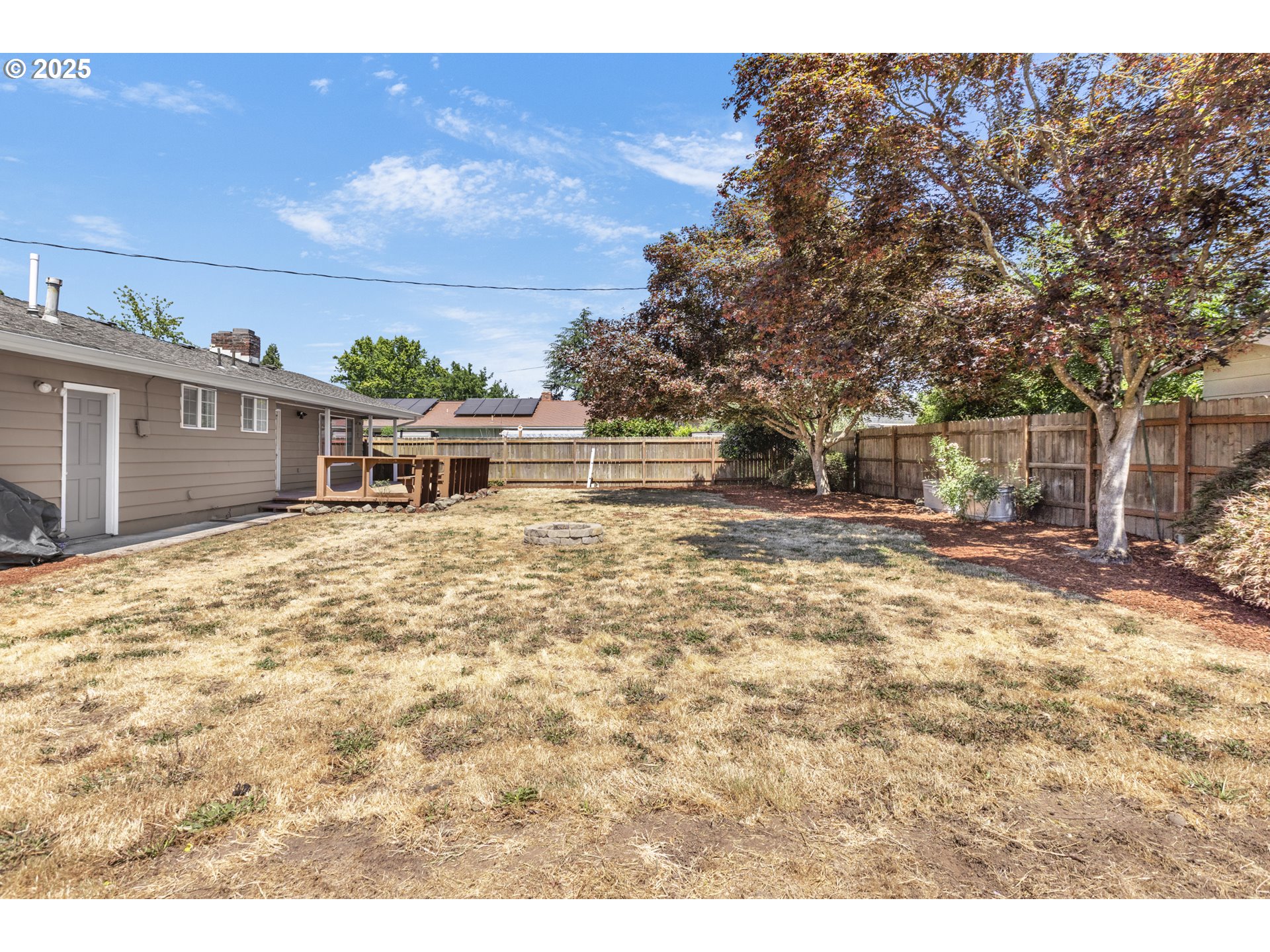 457 Archie Street Eugene, OR 97402 - Photo 40 of 48 a front view of a house with a yard