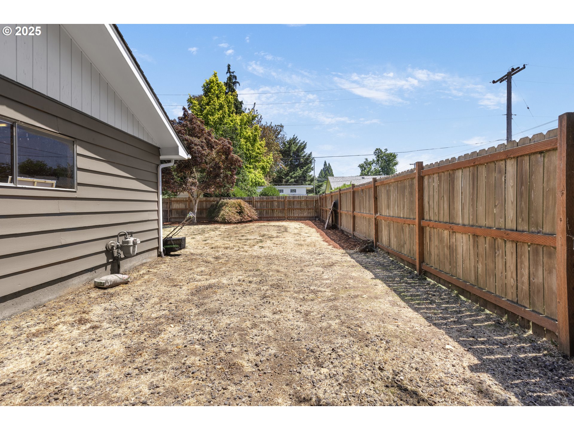 457 Archie Street Eugene, OR 97402 - Photo 42 of 48 a backyard of a house with a tree