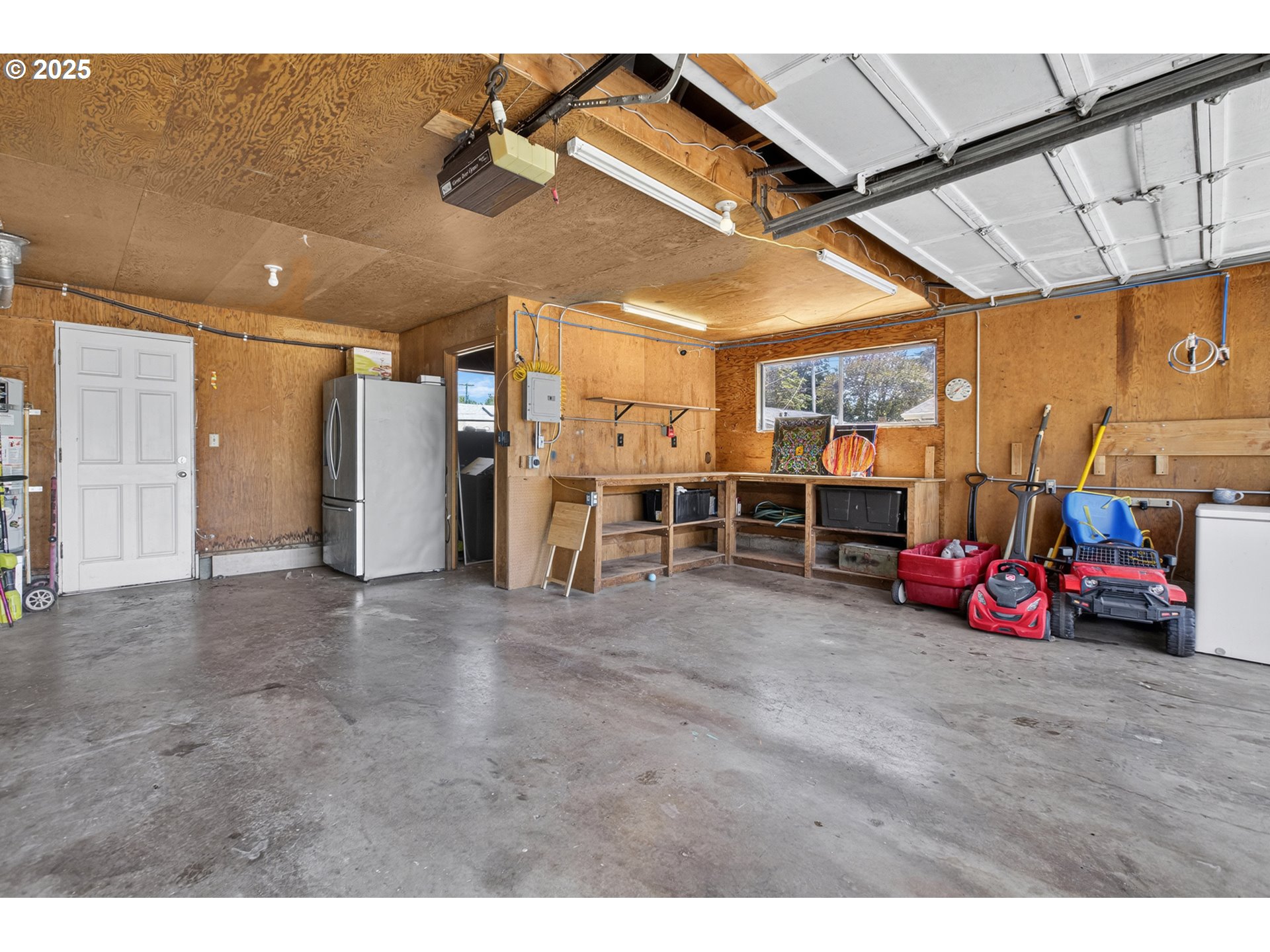 457 Archie Street Eugene, OR 97402 - Photo 43 of 48 a view of a livingroom with furniture and a garage