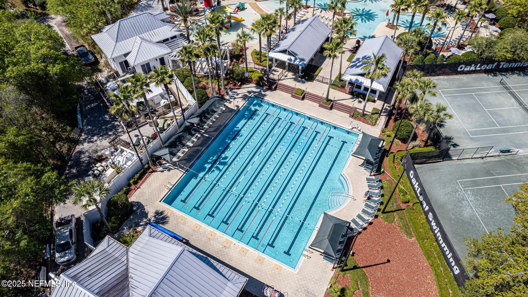 575 Oakleaf Plantation Parkway, Unit 1004 Orange Park, FL 32065 - Photo 16 of 22 a view of deck and patio