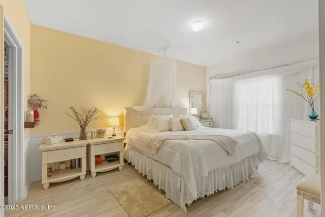 a bedroom with a bed and a cabinets