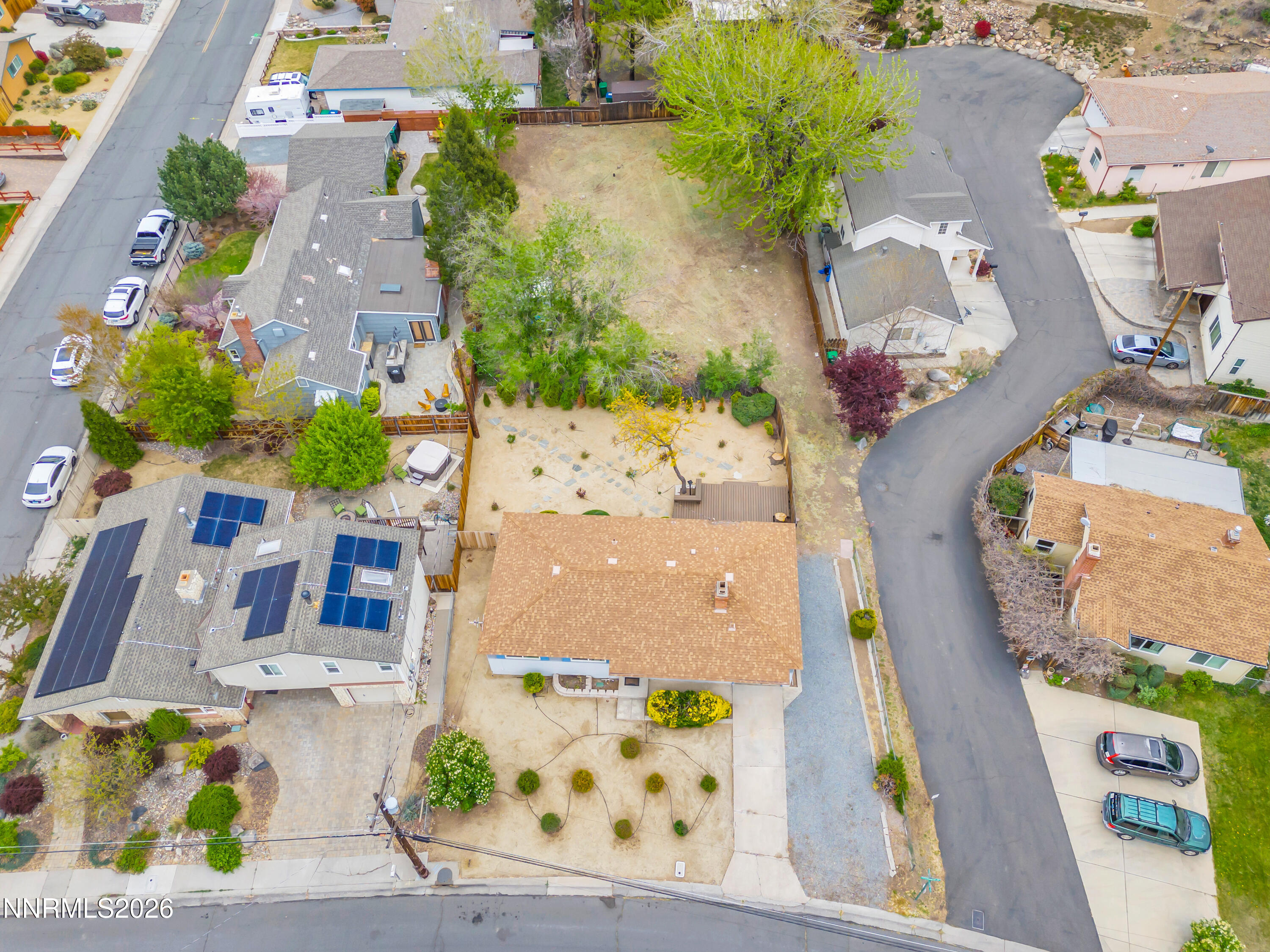 1208 Charles Drive Reno, NV 89509 - Photo 1 of 36 an aerial view of a house with yard