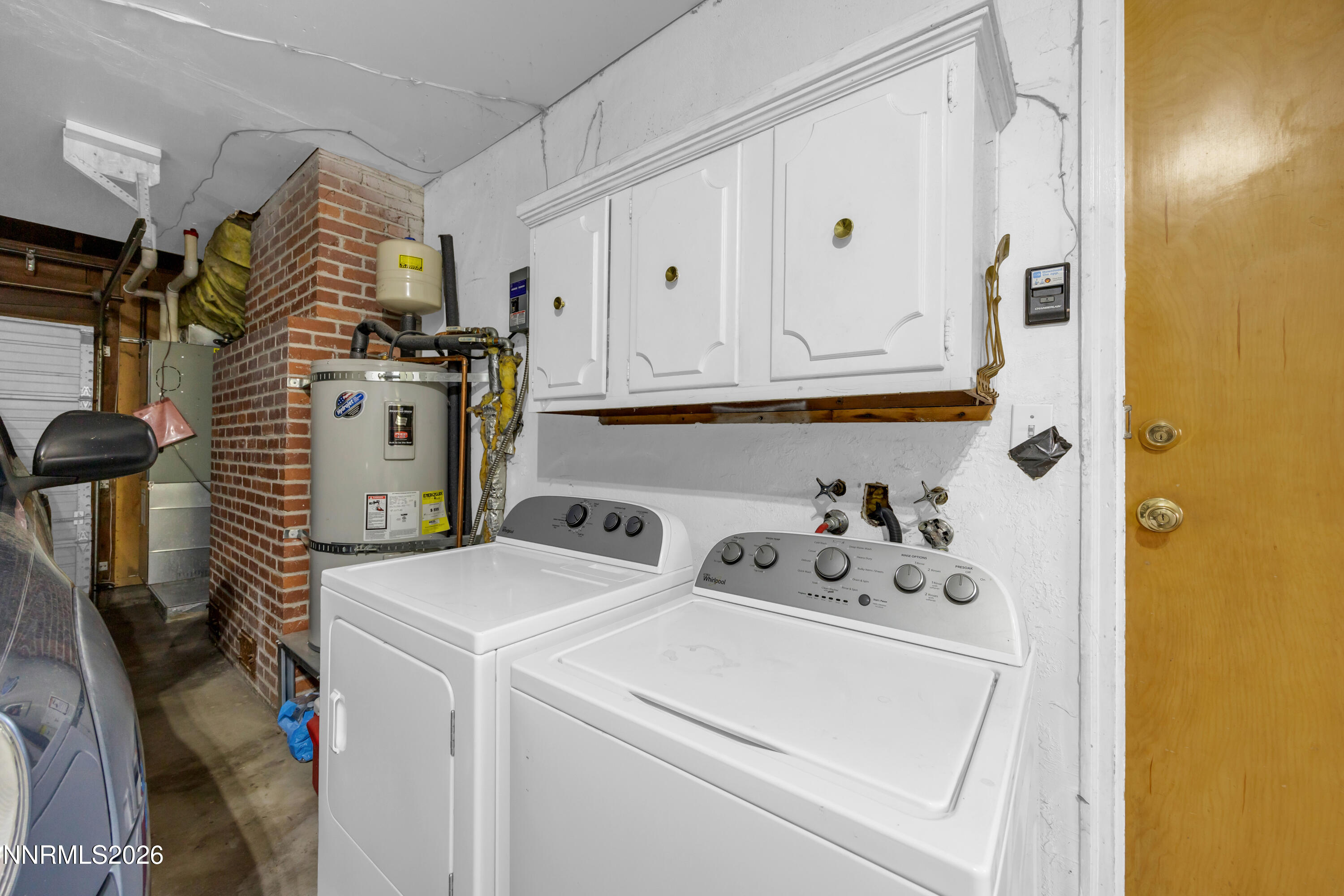 1208 Charles Drive Reno, NV 89509 - Photo 21 of 36 a utility room with dryer and washer