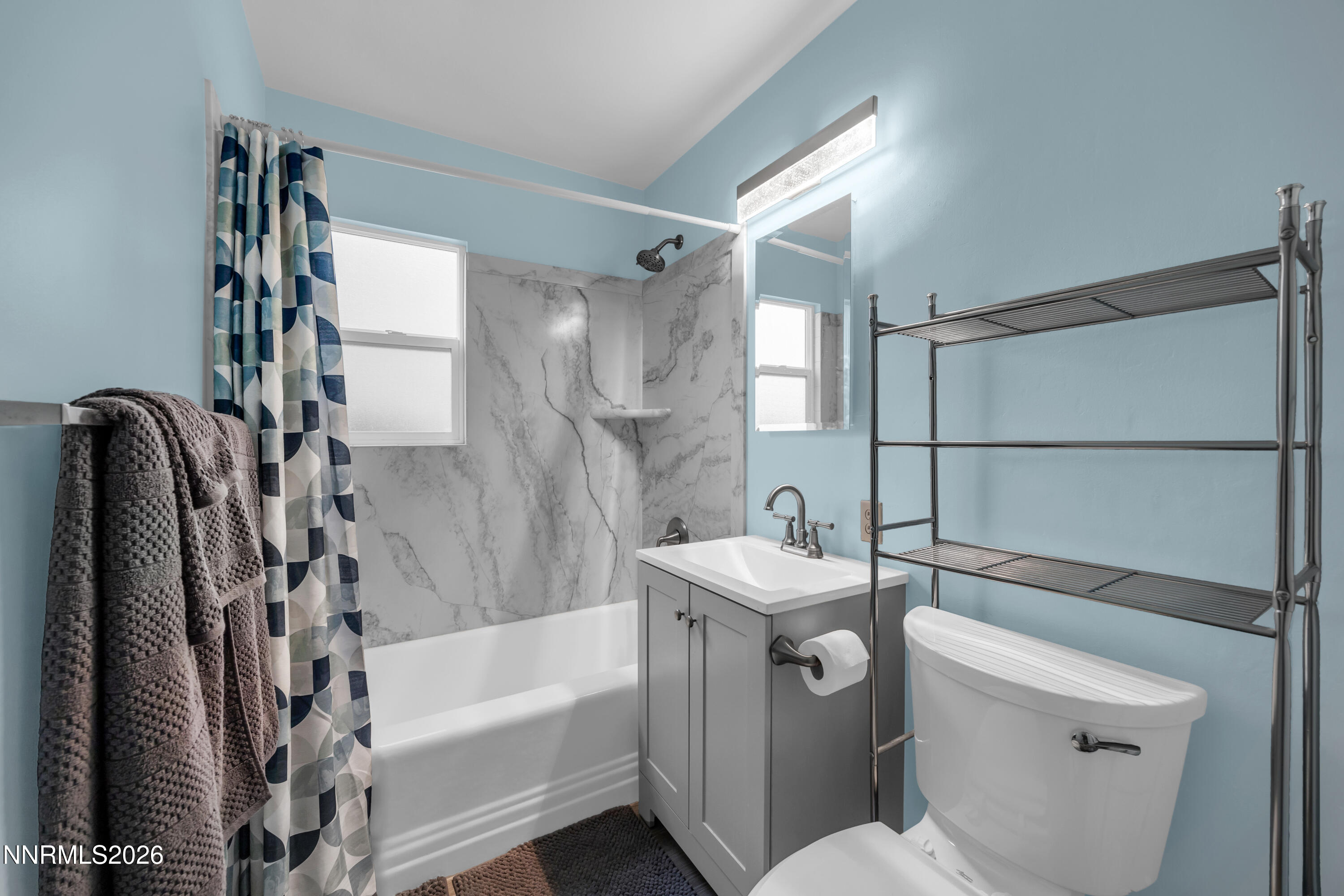 1208 Charles Drive Reno, NV 89509 - Photo 22 of 36 a bathroom with a sink toilet and shower