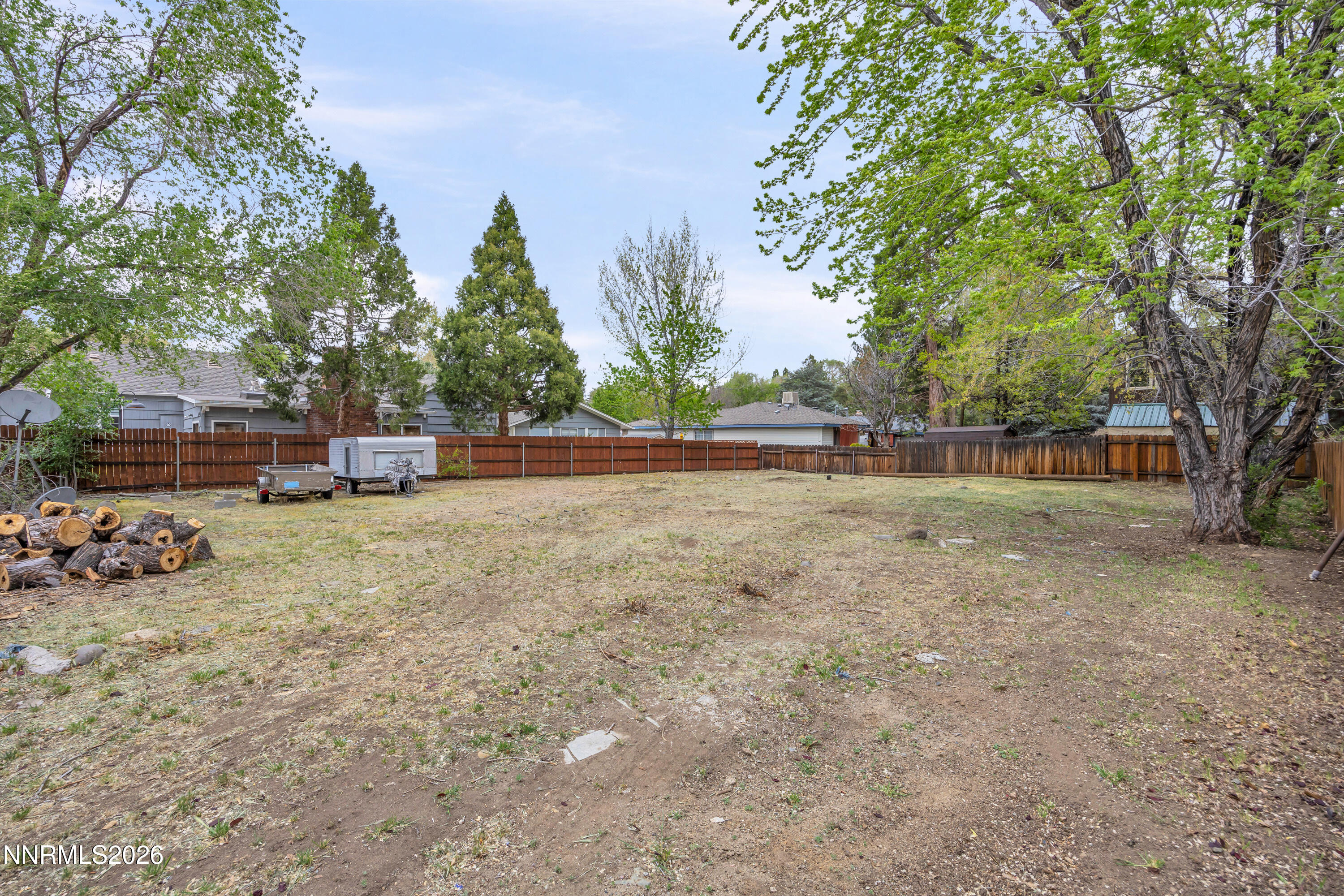 1208 Charles Drive Reno, NV 89509 - Photo 33 of 36 a backyard of a house with lots of green space