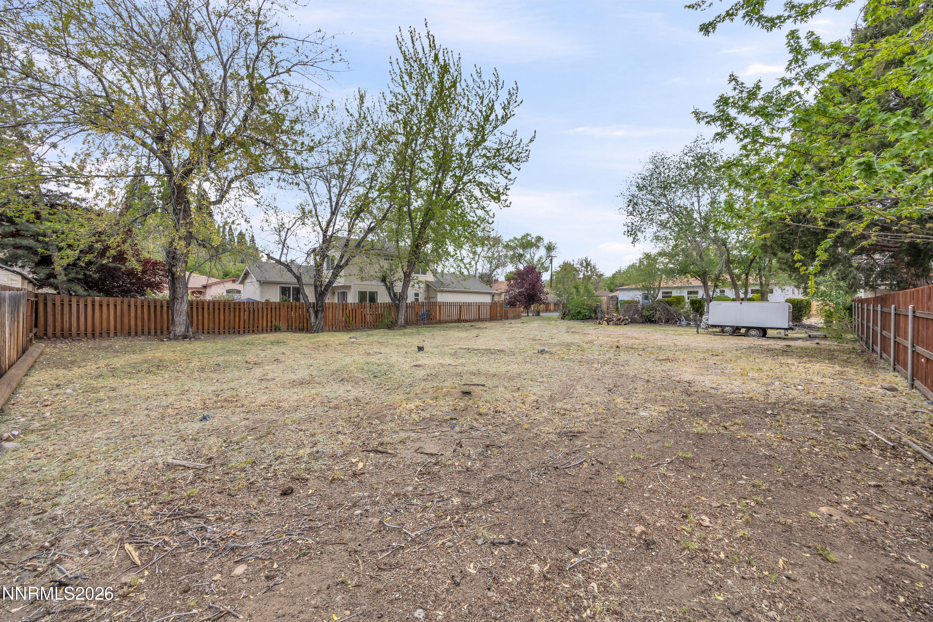 1208 Charles Drive Reno, NV 89509 - Photo 35 of 36 a view of a backyard with large trees