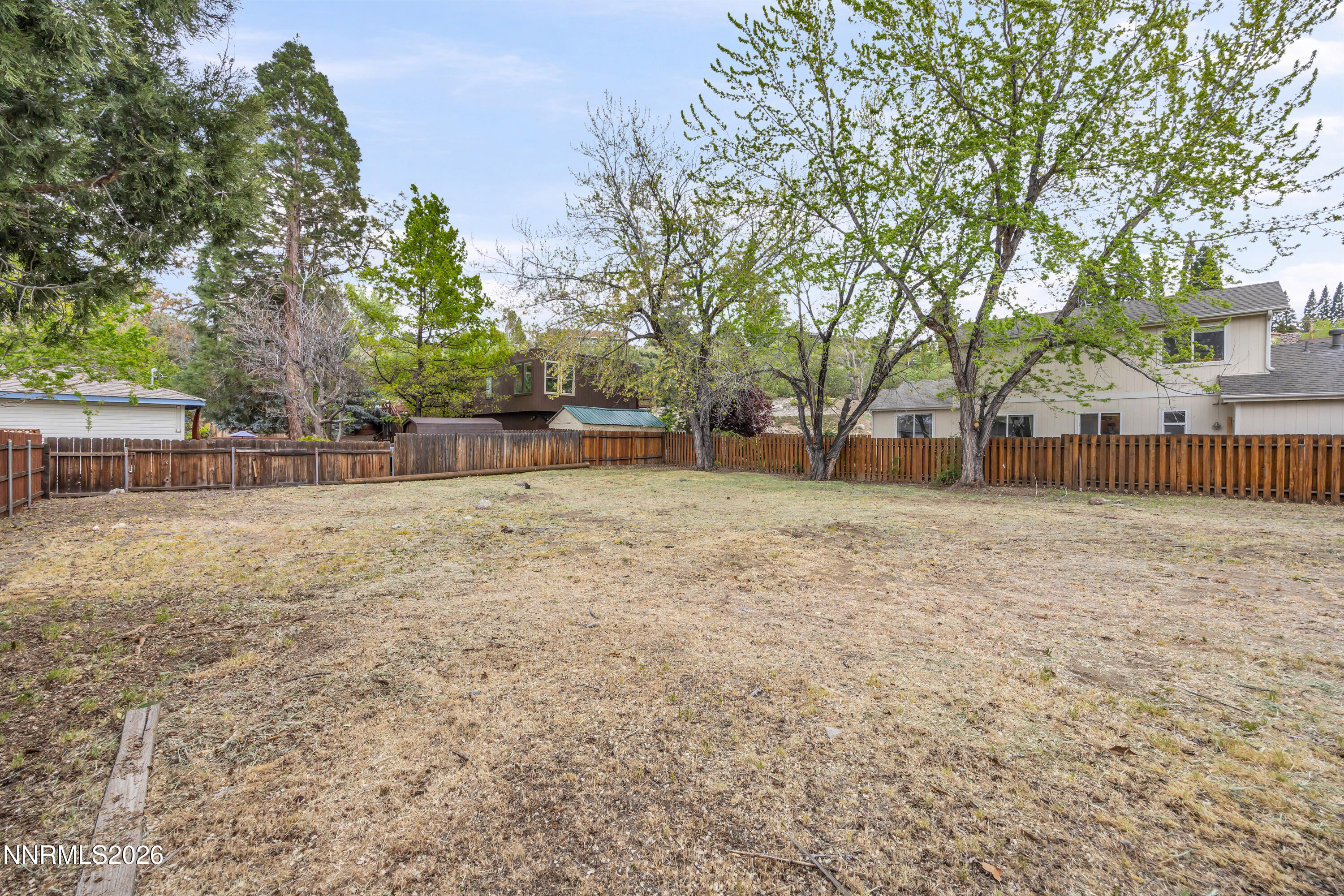 1208 Charles Drive Reno, NV 89509 - Photo 36 of 36 a view of backyard with large trees