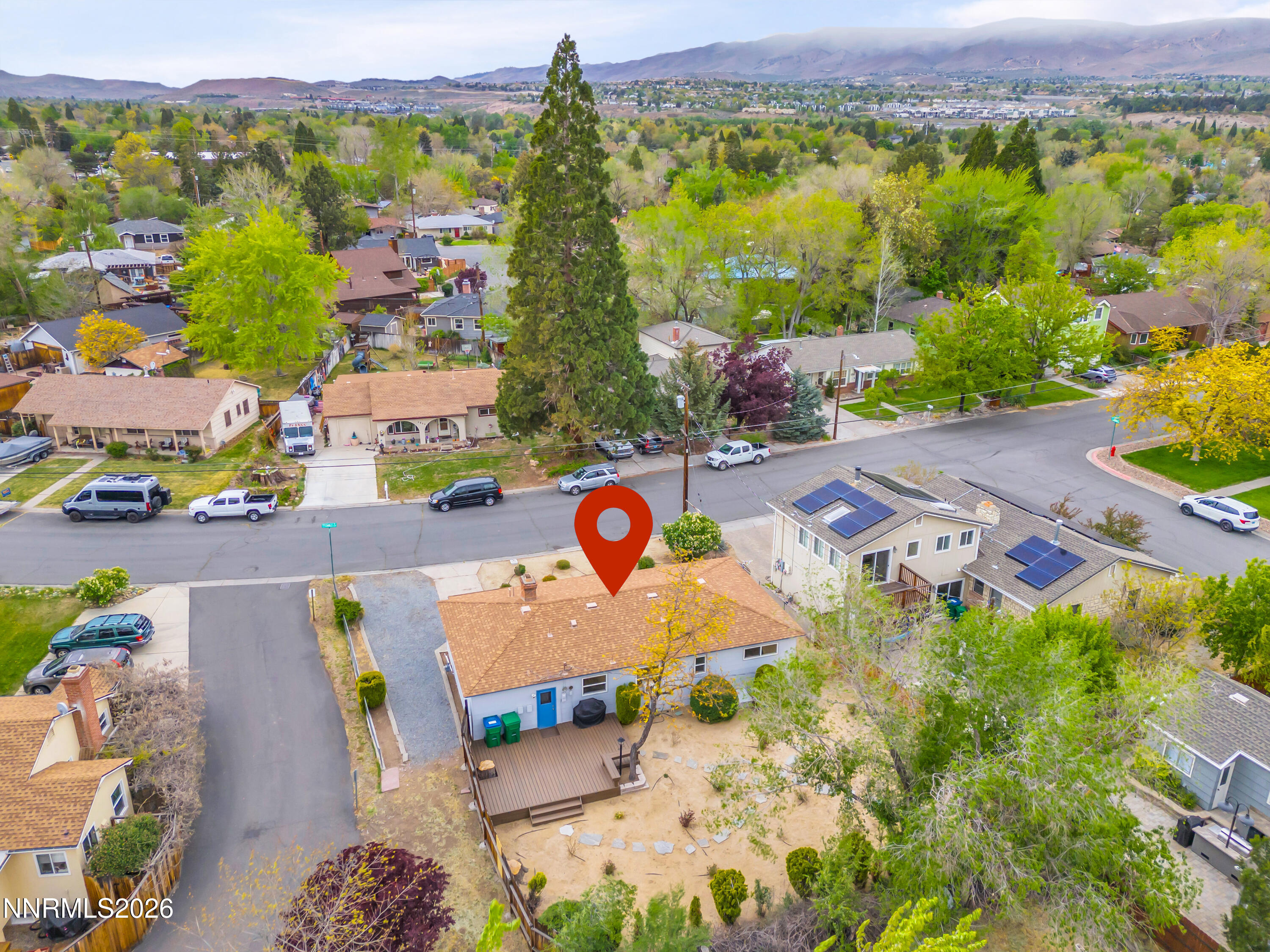 1208 Charles Drive Reno, NV 89509 - Photo 7 of 36 an aerial view of residential houses with outdoor space and parking