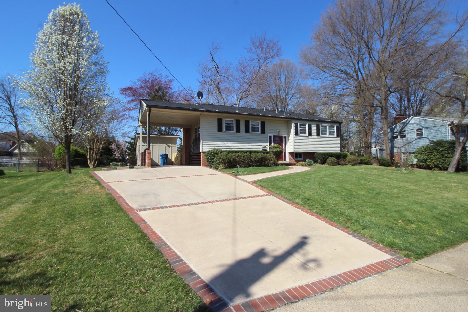 8504 Wagon Wheel Road Alexandria, VA 22309 - Photo 2 of 30 a view of a house with a yard