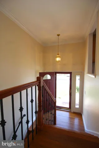 a view of entryway with wooden floor