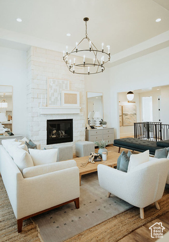 1547 North 1350 E Street, Unit 2 Mapleton, UT 84664 - Photo 6 of 18 Living room with a chandelier, a large fireplace, recessed lighting, and wood finished floors