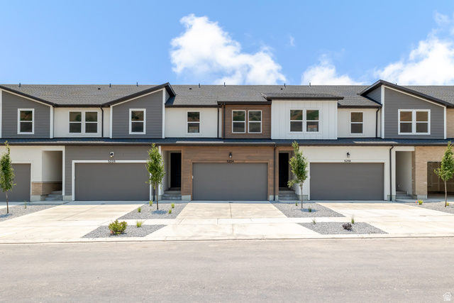 5224 South Acacia Drive, Unit 809 Mapleton, UT 84664 - Photo 1 of 23 Modern townhome exteriors featuring varied siding, multiple window configurations, and attached garages