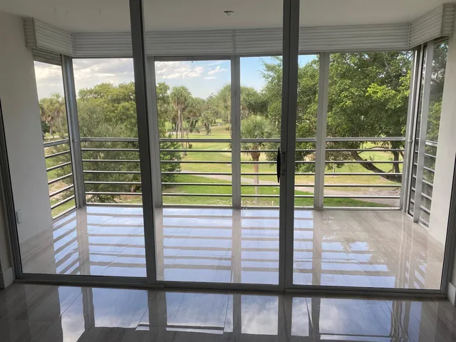 a view of a floor to ceiling window and a room