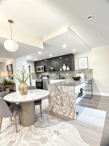 a view of a dining room with furniture