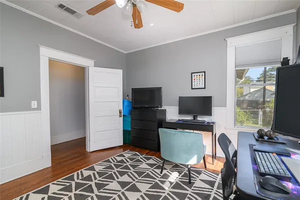 a workspace with furniture and window