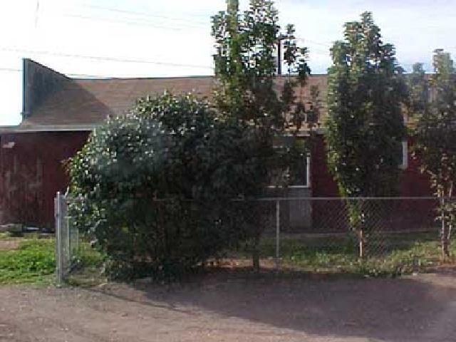 3101 Grandview Pavement Road Mabton, WA 98935 - Photo 3 of 6 a backyard of a house with lots of green space