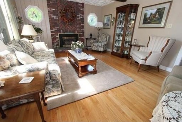 14 Highland Ridge Road Freetown, MA 02702 - Photo 11 of 20 a living room with furniture and a fireplace