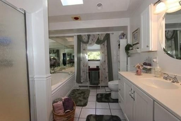 14 Highland Ridge Road Freetown, MA 02702 - Photo 13 of 20 a bathroom with a sink a toilet and shower