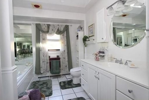 14 Highland Ridge Road Freetown, MA 02702 - Photo 14 of 20 a bathroom with a sink a toilet and shower