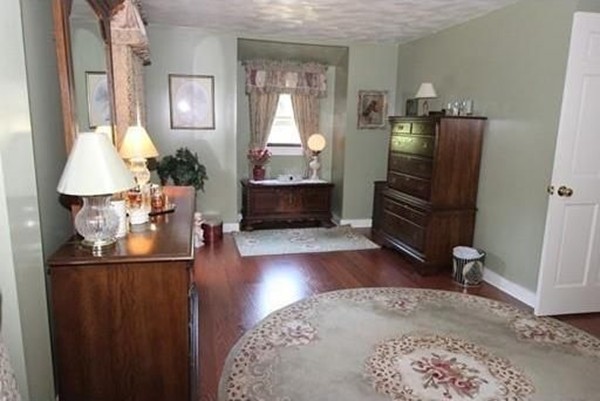 14 Highland Ridge Road Freetown, MA 02702 - Photo 15 of 20 a living room with furniture and a fireplace