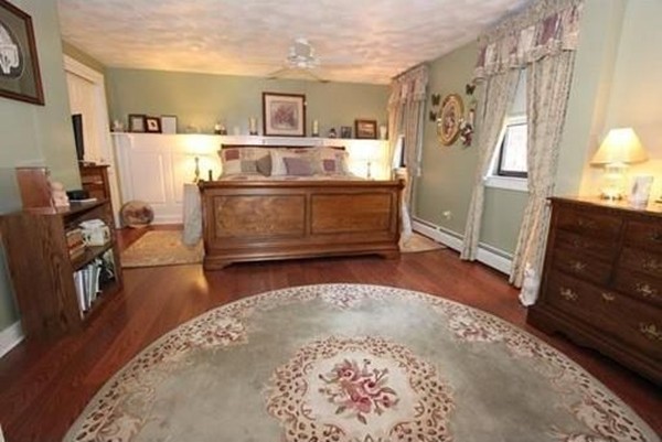 14 Highland Ridge Road Freetown, MA 02702 - Photo 16 of 20 a living room with a bed and a dresser