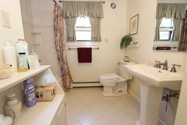 14 Highland Ridge Road Freetown, MA 02702 - Photo 20 of 20 a bathroom with a sink toilet and mirror