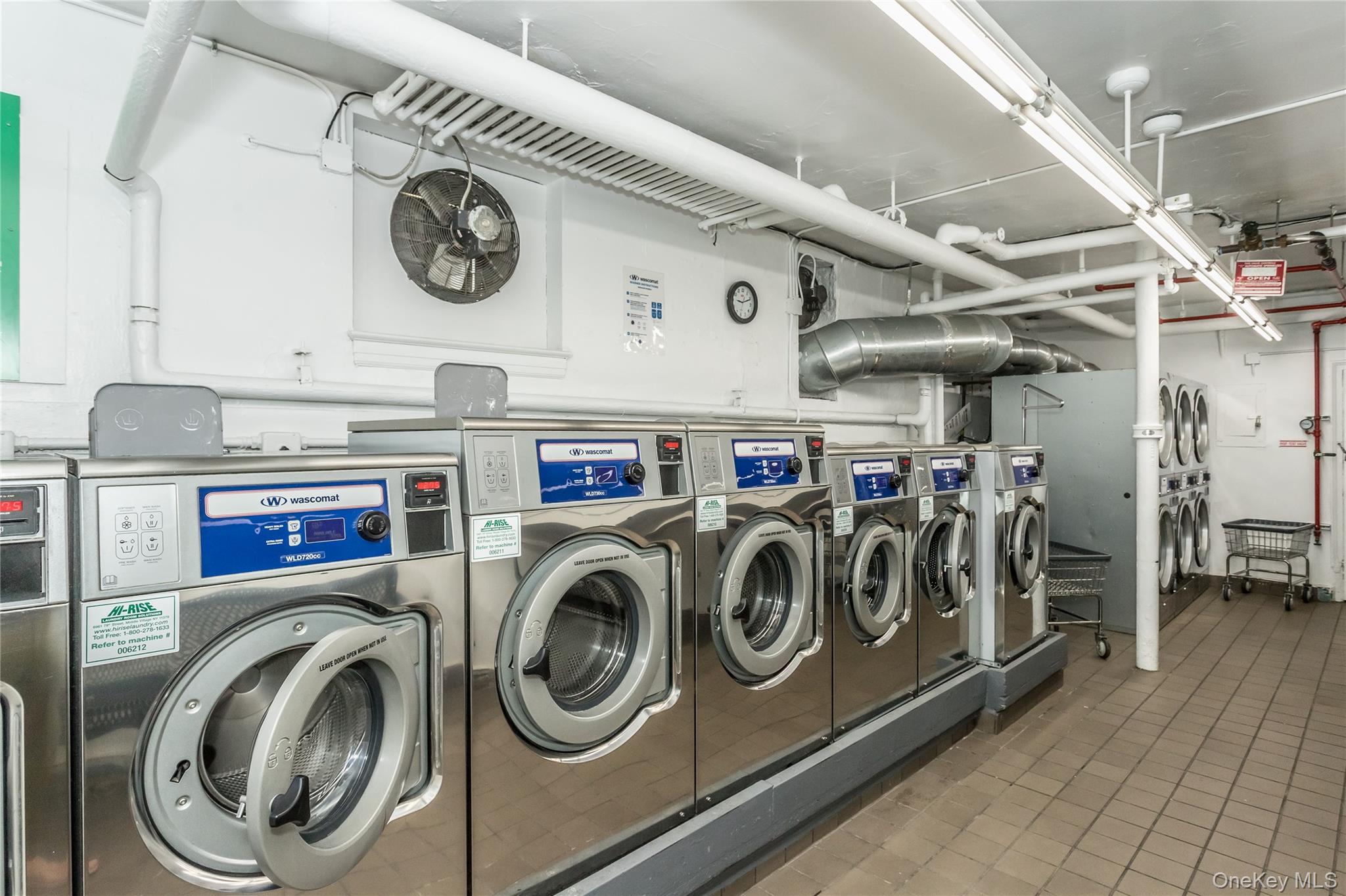 51-28 30th Avenue, Unit 3 Queens, NY 11377 - Photo 13 of 20 Shared laundry room featuring washer and dryer
