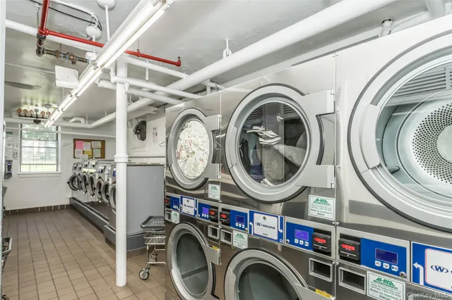 a view of living room with washer and dryer