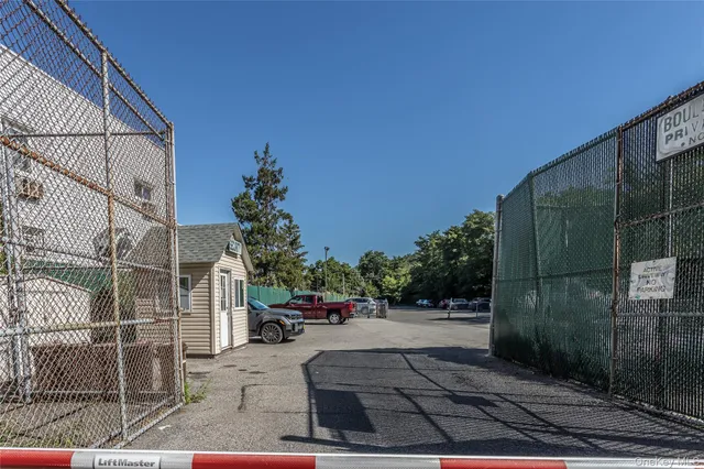 a view of street with parked cars