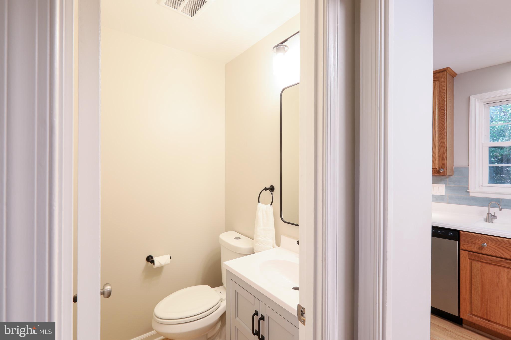 6710 Sydenstricker Road Springfield, VA 22153 - Photo 17 of 45 Main Fl half bath