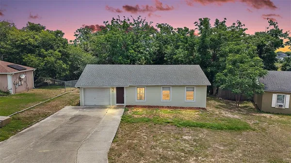 front view of a house with a yard