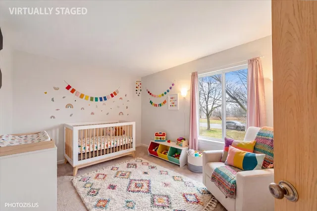 a bedroom with furniture and a window