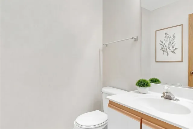 a bathroom with a sink and toilet