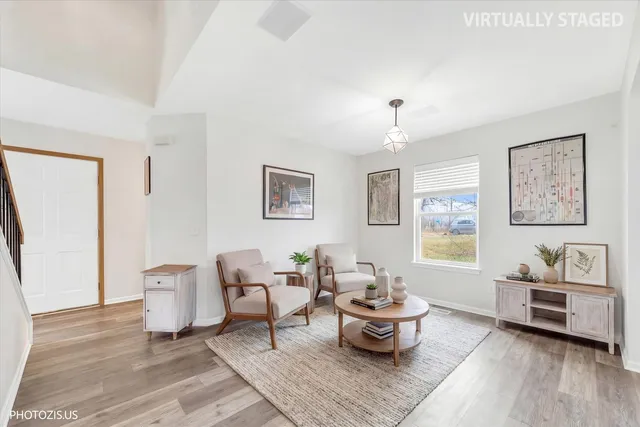 a living room with furniture and window