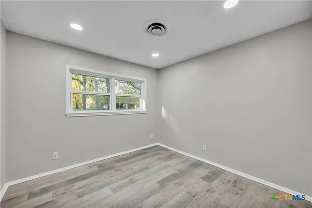 a house view with a backyard space